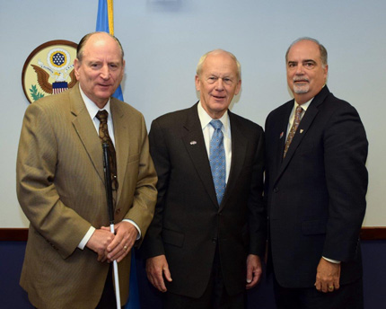 Poleo (right) and Kesteloot (left) spoke about their experiences with Chamberlin (center).