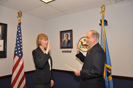 Carol Lowman, from the Department of the Army, is sworn-in by Chairperson Tony Poleo, as a member of the Committee for Purchase From People Who Are Blind or Severely Disabled