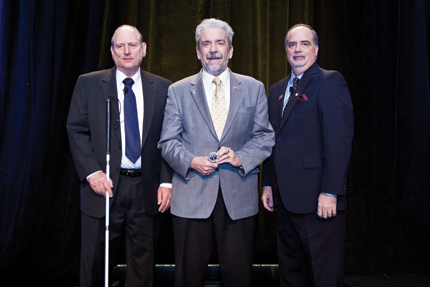 Left to right:  Vice Chairperson James M. Kesteloot, Recipient Edward R. Guthrie, and Chairperson Poleo
