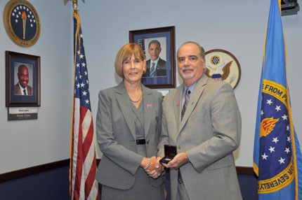Left to right:  Honoree Dr. Carol E. Lowman and U.S. AbilityOne Commission Chairperson J. Anthony (Tony) Poleo.