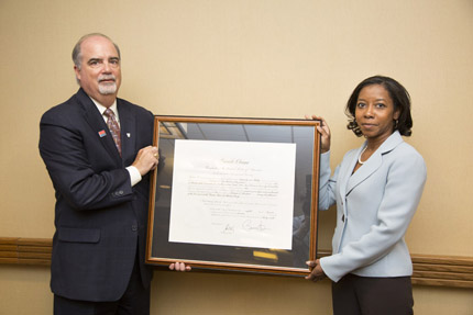 Chairperson J. Anthony Poleo swears in Commission member Virna L. Winters, Department of Commerce.